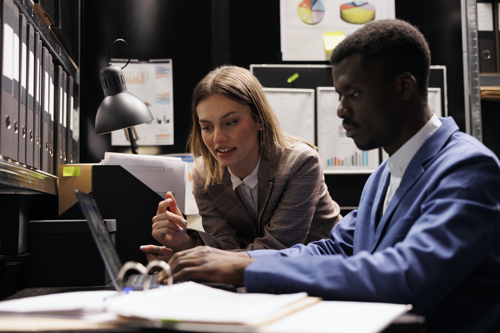 Bookkeepers analyzing bureaucracy record